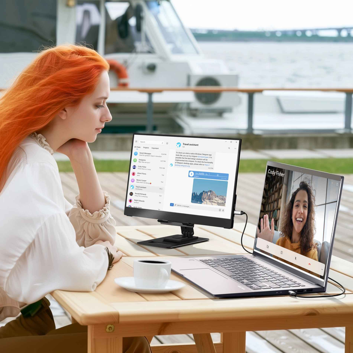Solo user enjoying extended display on-the-go | Ingnok YN02D Table Portable Laptop Monitor